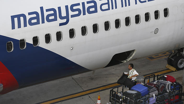 Malaysia Airlines is temporarily limiting the amount of checked-in luggage on some European flights