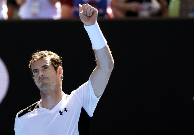 Andy Murray of Britain waves to the crowd after defeating Sam Groth of Australia in their second round match at the Australian Open tennis championships in Melbourne Australia Thursday Jan. 21 2016