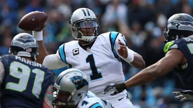 CHARLOTTE NC- JANUARY 17 Cam Newton #1 of the Carolina Panthers in action against the Seattle Seahawks during the NFC Divisional Playoff Game at Bank of America Stadium