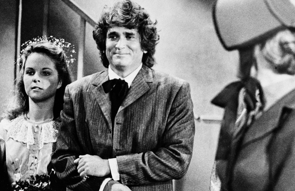 Actress Melissa Sue Anderson left who plays Mary for the television series' Little House on the Prairie is escorted by actor Michael Landon who plays her father are shown during the taping of Mary's wedding scene in Los Angeles Calif. Sept. 11