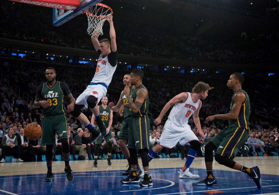 New York Knicks forward Kristaps Porzingis follows through on a dunk against the Utah Jazz during the second quarter of an NBA basketball game Wednesday Jan. 20 2016 in New York. ORG XMIT NYJJ105