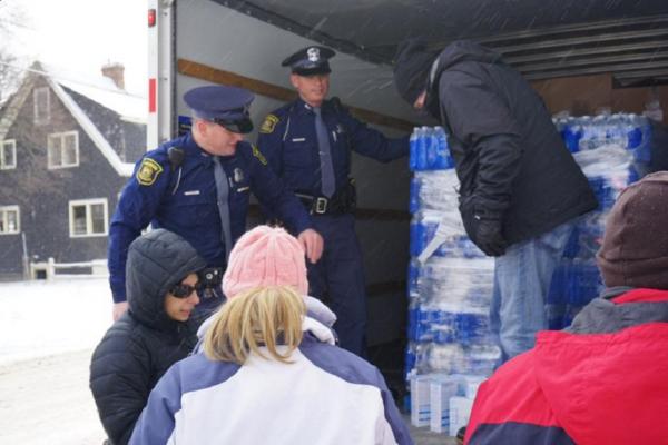 Charging Flint residents for poisoned water is a crime all its own