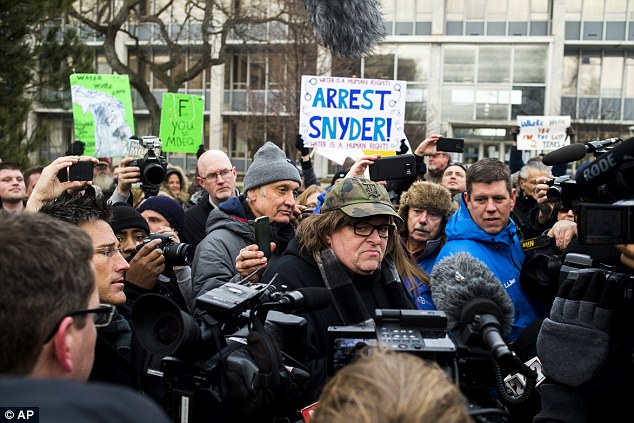 Director Michael Moore was at the front lines of a rally he held in his hometown of Flint Michigan where he claimed government officials intentionally contaminated the city's water supply