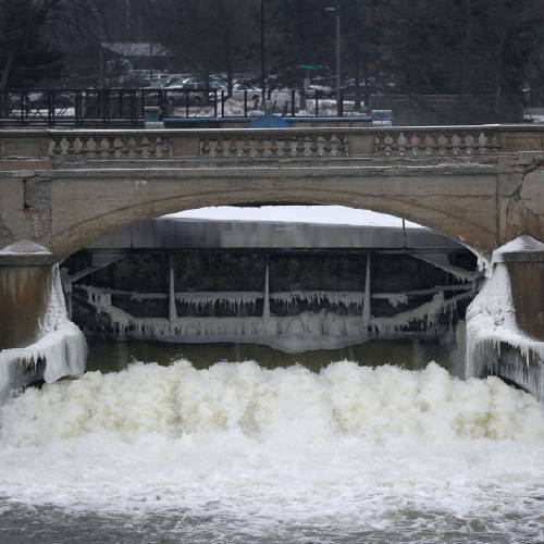 River is shown near downtown Flint Mich. Thursday Jan. 21 2016. Residents in the former auto-making hub — a poor largely minority city — feel their complaints about lead-tainted water flowing through their taps have been slight