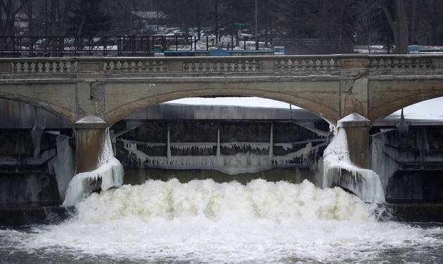 River near downtown Flint Mich. City leaders are floating a shockingly high price to replace the city's water infrastructure damaged after the state’s disastrous decision in 2014 to use the Flin