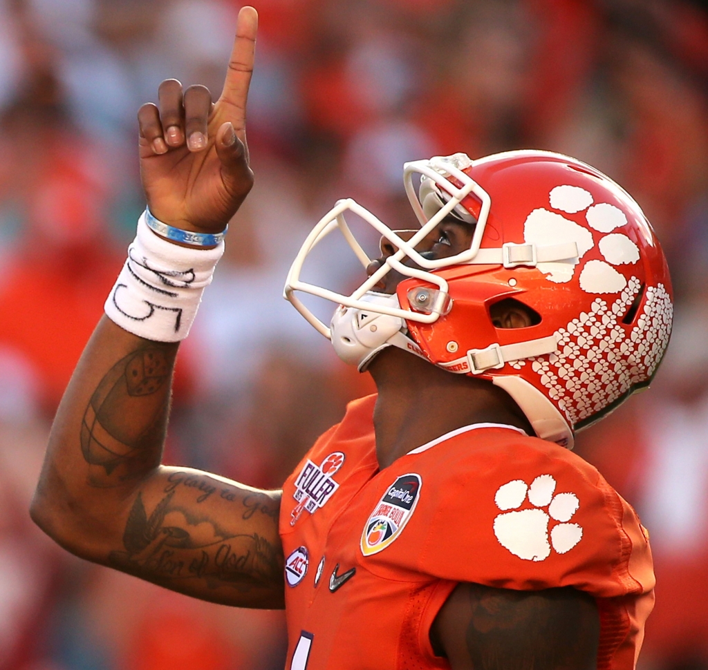 503033332 Clemson quarterback Deshaun Watson celebrates during the Tigers’ Orange Bowl win