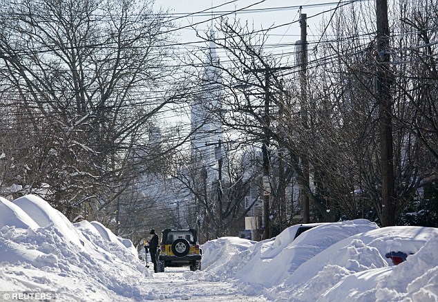 A mother and her one-year-old son have died of carbon monoxide poisoning after snow blocked the tailpipe of their car as they looked for a parking place near their home in Passaic New Jersey