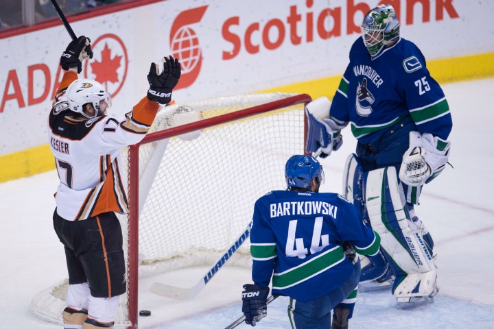 Anaheim Ducks centre Ryan Kesler celebrates his goal past Vancouver Canucks goalie Jacob Markstrom as Vancouver Canucks defenceman Matt Bartkowski looks on during second period NHL action Vancouver B.C. Friday Jan. 1 2016