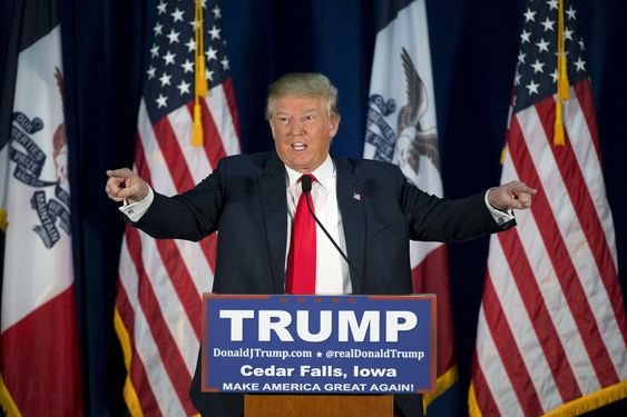 Donald Trump points to the crowd while speaking at a rally Tuesday Jan. 12 2016 in Cedar Falls Iowa