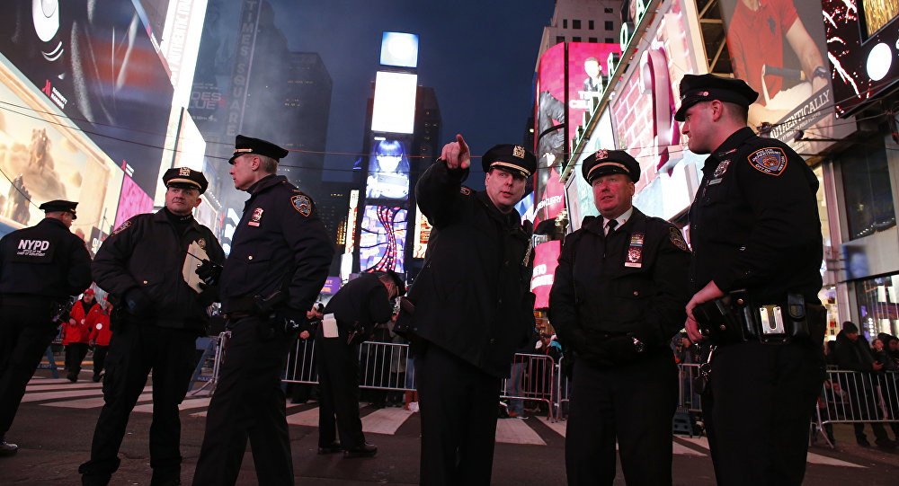 New York City police officers patrol in Times Square ahead of New Years events in New York