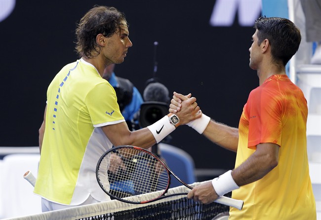 Rafael Nadal left of Spain congratulates compatriot Fernando Verdasco after their first round match at the Australian Open tennis championships in Melbourne Australia Tuesday Jan. 19 2016