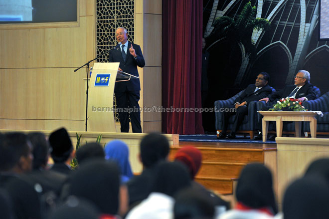 Najib is seen speaking during the special assembly at the Finance Ministry here yesterday. — Bernama