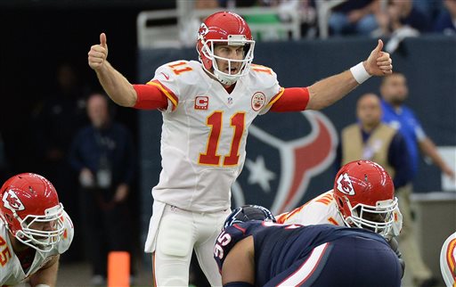 Kansas City Chiefs quarterback Alex Smith calls a play during the first half of an NFL wild-card playoff football game against the Houston Texans Saturday Jan. 9 2016 in Houston