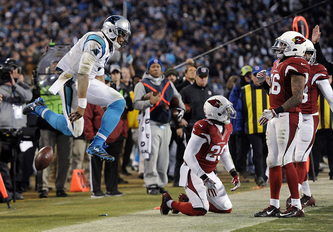 Carolina Panthers Cam Newton celebrates a first down run during the second half the NFL football NFC Championship game against the Arizona Cardinals Sunday Jan. 24 2016 in Charlotte N.C