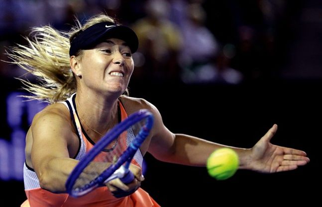 Maria Sharapova of Russia hits a forehand return to Lauren Davis of the United States during their third round match at the Australian Open tennis championships in Melbourne Australia Friday Jan. 22 2016