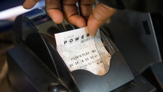 Host Sam Arlen speaks as the winning Powerball numbers are about to be drawn at the Florida Lottery studio in Tallahassee Florida