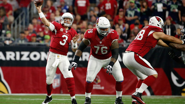 GLENDALE AZ- JANUARY 03 Quarterback Carson Palmer #3 of the Arizona Cardinals throws a pass during the thrid quarter of the NFL game against the Seattle Seahawks at the University of Phoenix Stadium