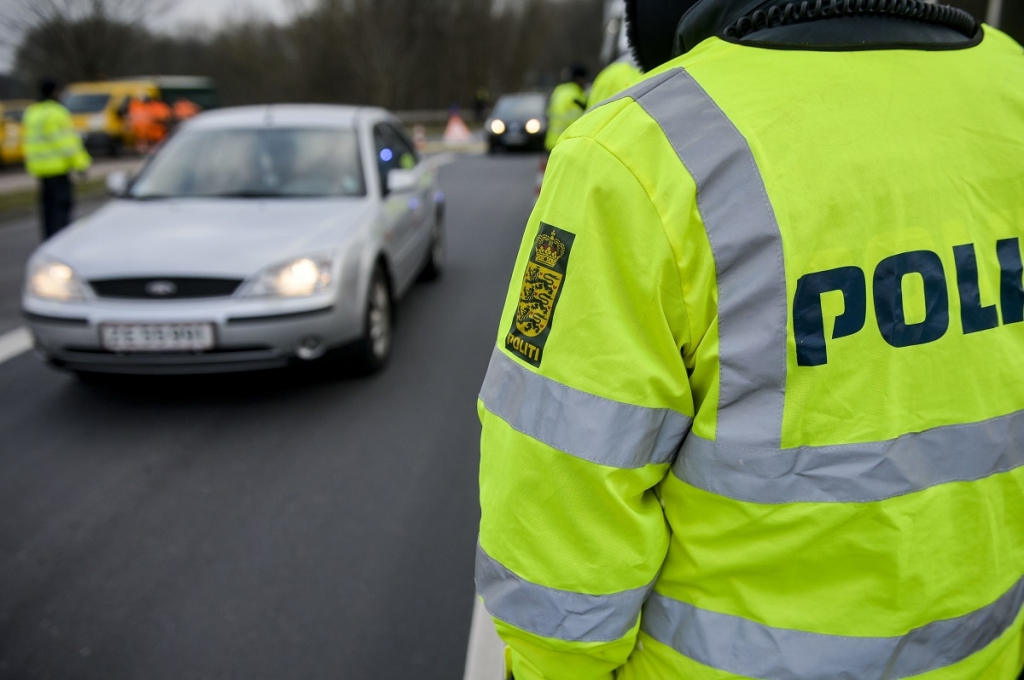 Danish Police officers check vehicles at the bordertown of Krusa Denmark yesterday. Denmark imposed temporary identity checks on its border with Germany on Monday following a similar move by Sweden dealing a double blow to Europe's fraying passport-free