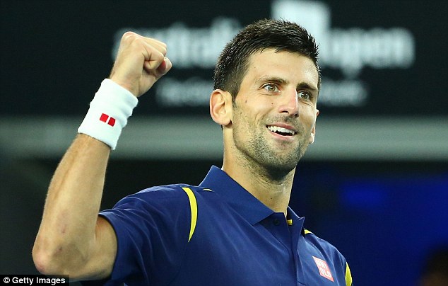 Novak Djokovic celebrates after defeating Kei Nishikori in their quarter-final match at the Australian Open tennis championships in Melbourne