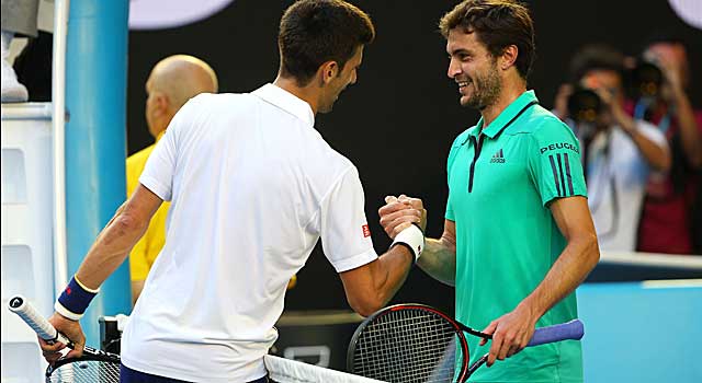 Novak Djokovic greets Gilles Simon after a grueling five-setter Sunday in Melbourne