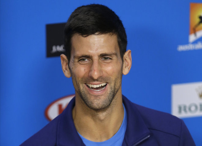 Serbia's Novak Djokovic smiles during a press conference ahead of the men's singles final at the Australian Open tennis championships in Melbourne Australia Saturday Jan. 30 2016. Djokovic will play Britain's Andy Murray in the men's final on Sunday J