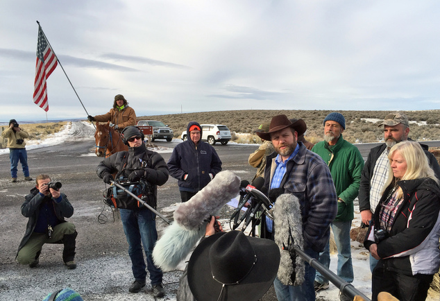 Ammon Bundy speaks to reporters at the Malheur National Wildlife Refuge in Burns Ore. on Thursday Jan. 14 2016. Bundy is the leader of a small armed gro