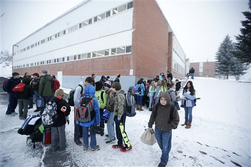 Students arrive at the Hines Middle School after Harney County School District reopened it's doors Monday Jan. 11 2016 in Hines Ore. The armed takeover of Oregon wildlife refuge forced area schools to close for the week