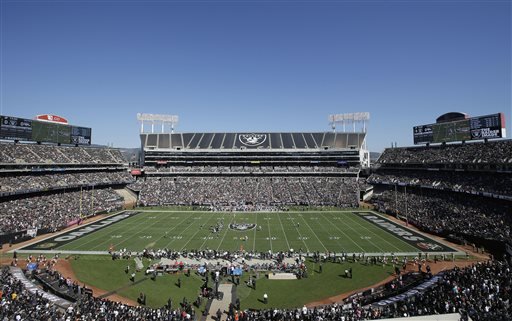 Oakland Coliseum during an NFL game between the Oakland Raiders and Denver Broncos in Oakland Calif. From the costume-clad crazies in the Black Hole who turn football Sundays into Halloween the