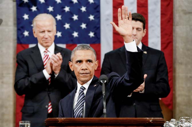 Obama waves at the conclusion of his State of the Union address to a joint session of Congress on Capitol Hill in Washington. Pic  AFP