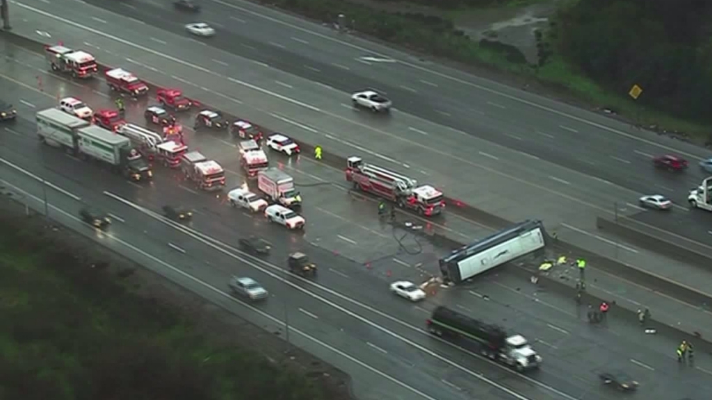 Officials are seen responding to a deadly crash involving a Greyhound bus in San Jose on Jan. 19 2016