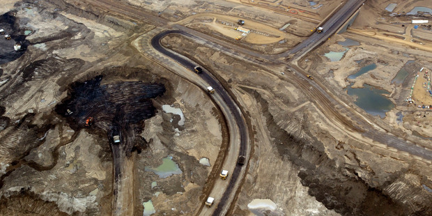 Oil is mined at Royal Dutch Shell Plc's Albian Sands mine near Fort McMurray Alberta Canada