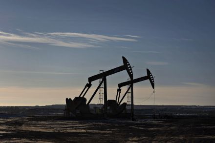 Oil prices move away from 12-year lows as China shares rise