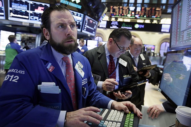 Stocks plunge along with price of oil; Dow off 500 points