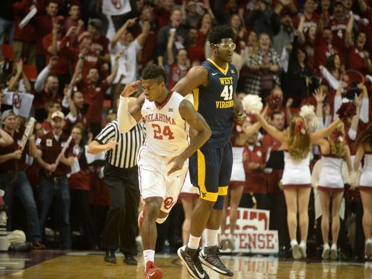 Oklahoma's Buddy Hield reacts after making a 3-pointer against WVU