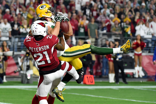 Cardinals' 'Hail Larry' trumps Rodgers' Hail Mary
