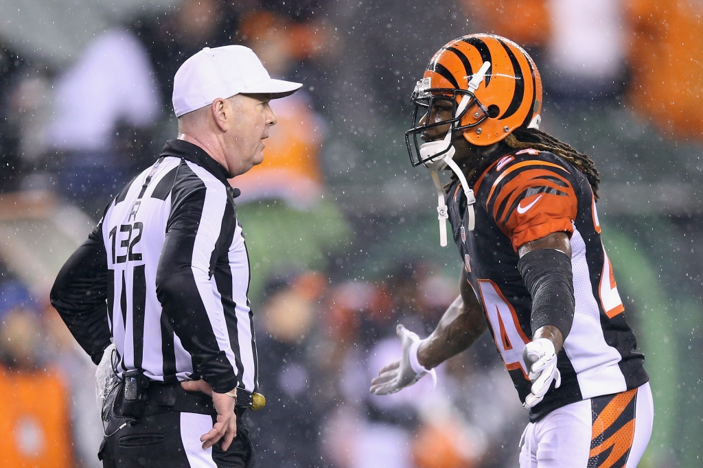 CINCINNATI OH- JANUARY 09 Adam Jones #24 of the Cincinnati Bengals argues a call with referee John Parry #132 in the fourth quarter against the Pittsburgh Steelers during the AFC Wild Card Playoff game at Paul Brown Stadium