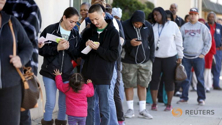 People line up to buy Powerball lottery tickets at Kavanagh Liquors in San Lorenzo Californiaon on Jan. 12 2016. /AP