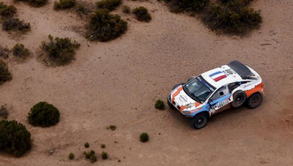 The Mitsubishi of Lionel Baud of France is seen on the side of the road during the seventh stage in the Dakar Rally 2016 near Uyuni Bolivia Jan. 9 2016