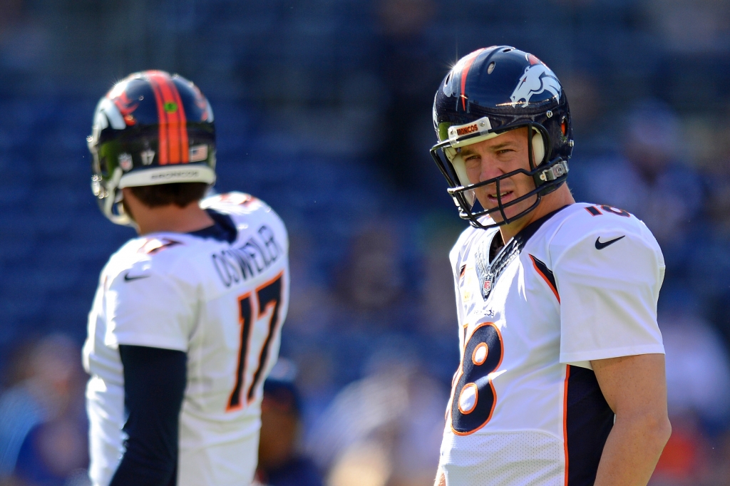 Dec 14 2014 San Diego CA USA Denver Broncos quarterback Peyton Manning and quarterback Brock Osweiler before the game against the San Diego Chargers at Qualcomm Stadium. Mandatory Credit Jake Roth-USA TODAY Sports