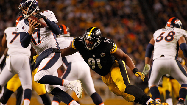 PITTSBURGH PA- DECEMBER 20 Stephon Tuitt #91 of the Pittsburgh Steelers goes in for the sack on Brock Osweiler #17 of the Denver Broncos during the game at Heinz Field