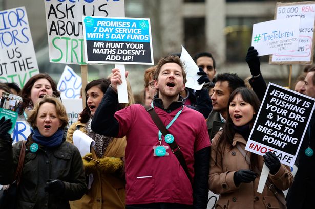 Protesters outside St Thomas&#x27 Hospital in London as junior doctors go on strike for 24 hours