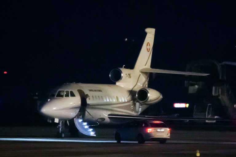 AFP  Richard JuilliartA man disembarks from a Falcon 900 of the Swiss Air Force after it landed on the tarmac of Geneva's airport