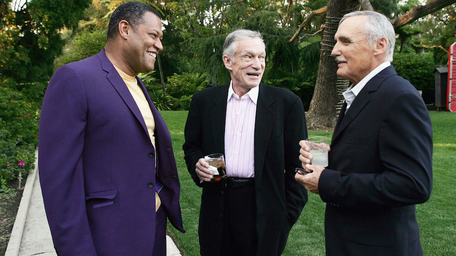 Hugh Hefner Lawrence Fishburne and Dennis Hopper in 2005 at the Playboy Mansion SOURCE Getty