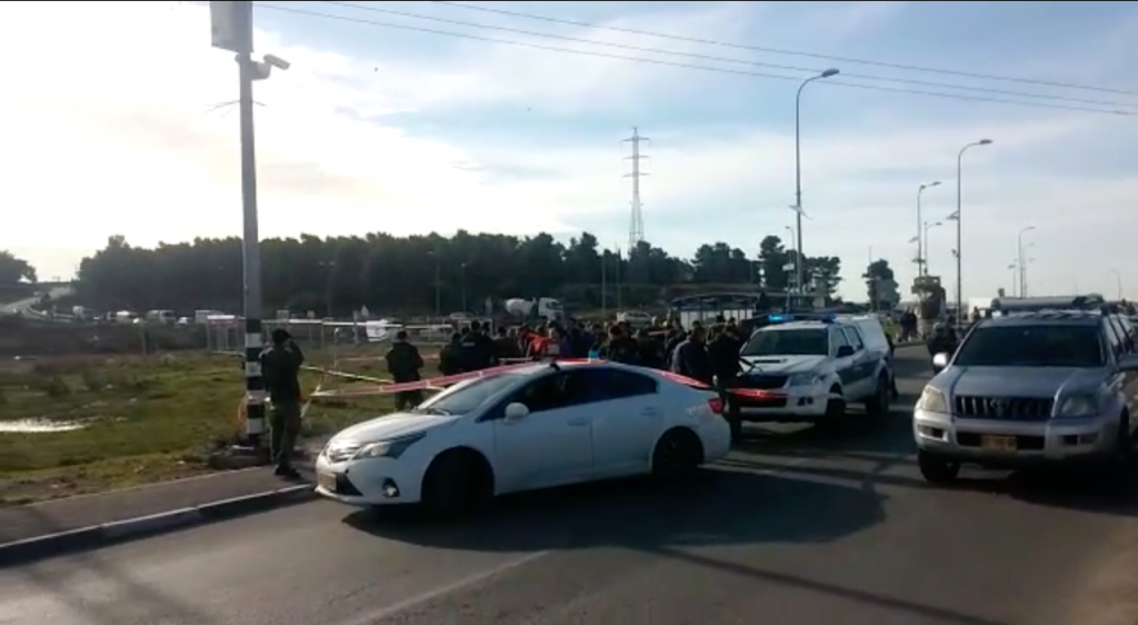 Police at the scene of a stabbing attack at the Gush Etzion junction in the West Bank