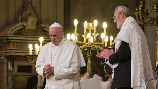 Pope Francis is flanked by Rabbi Riccardo Di Segni right during a visit to the Great Synagogue of Rome