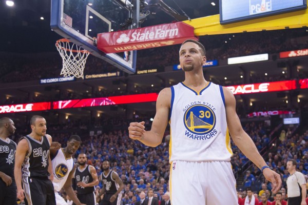 Stephen Curry leads Golden State's 120-90 rout of San Antonio