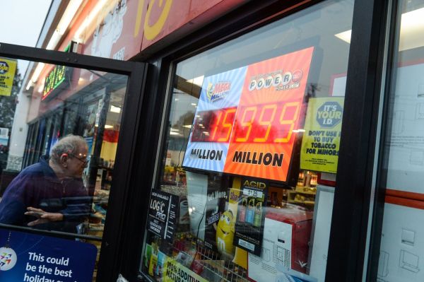 A Powerball sign reads $999 million dollars