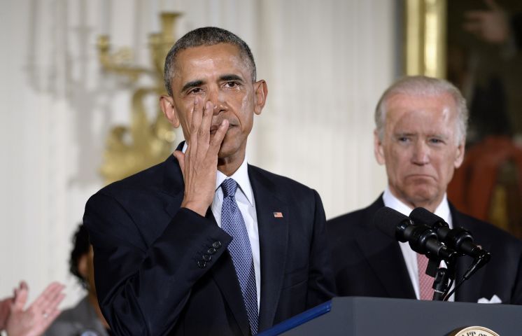 President Barack Obama cries during a news conference Tuesday to announce executive actions intended to expand background checks for some firearm purchases and step up federal enforcement of the nation's gun laws