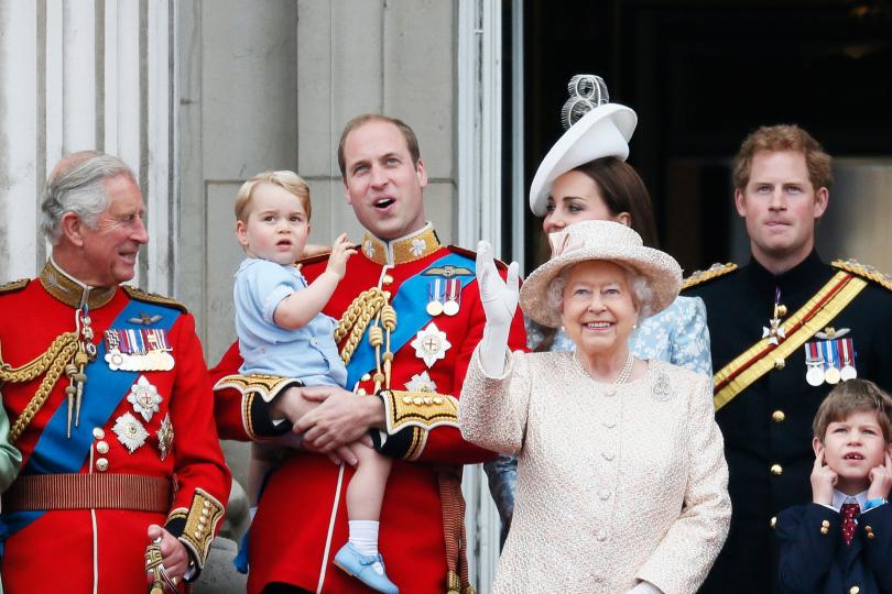 Britain's Prince Charles Prince Willian holding Prince George Catherine the Duchess of Cambridge Queen Elizabeth Prince Harry stand on the balcony at Buckingham Palace