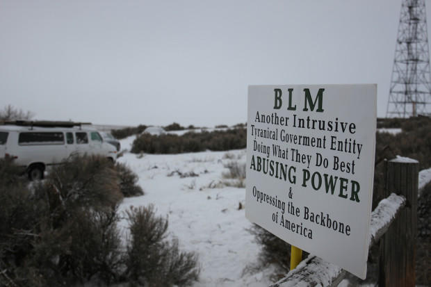 Protesters blocked the entrance to the refuge Sunday hanging anti-government signs on the fenceposts